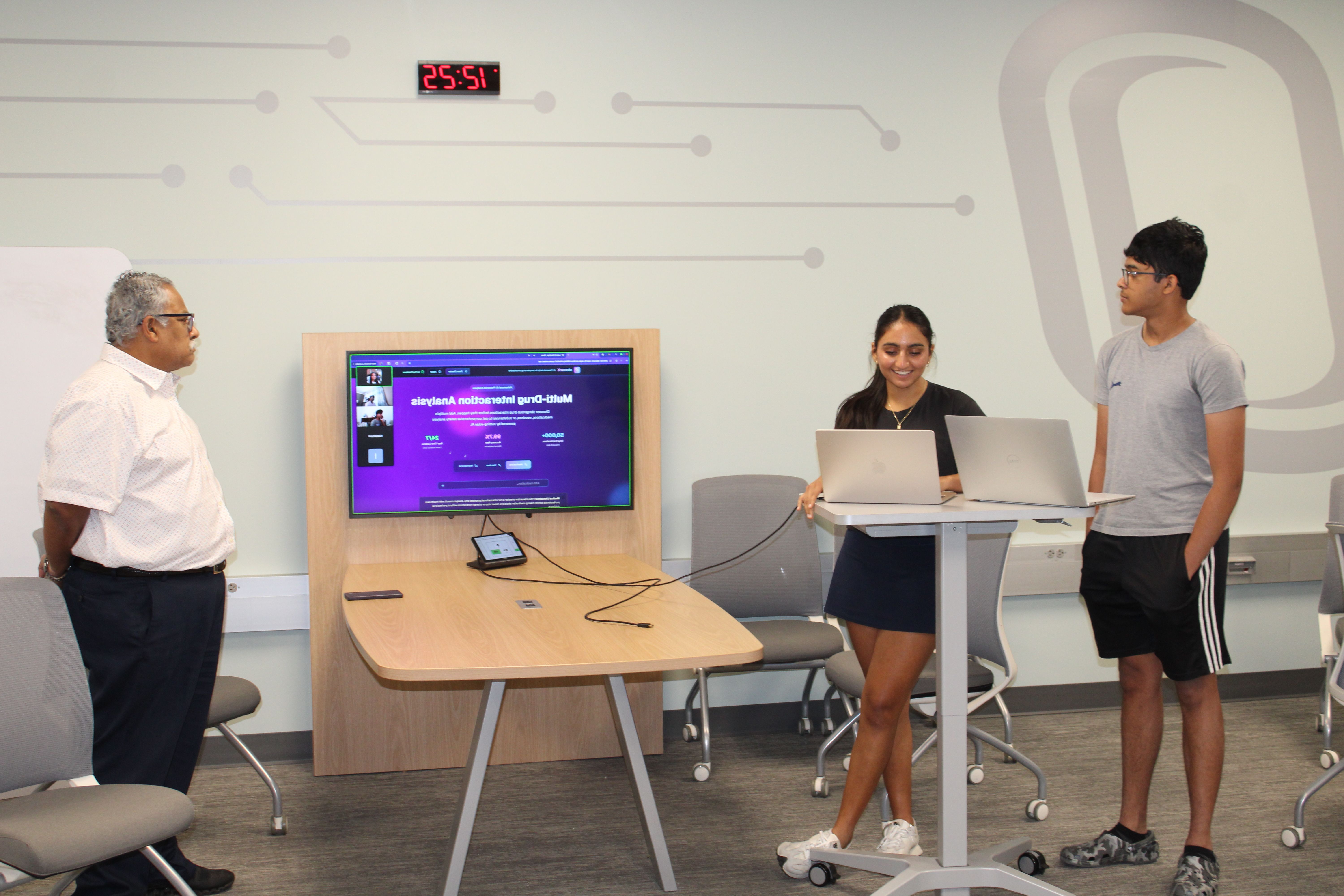 Diverse group of students coding