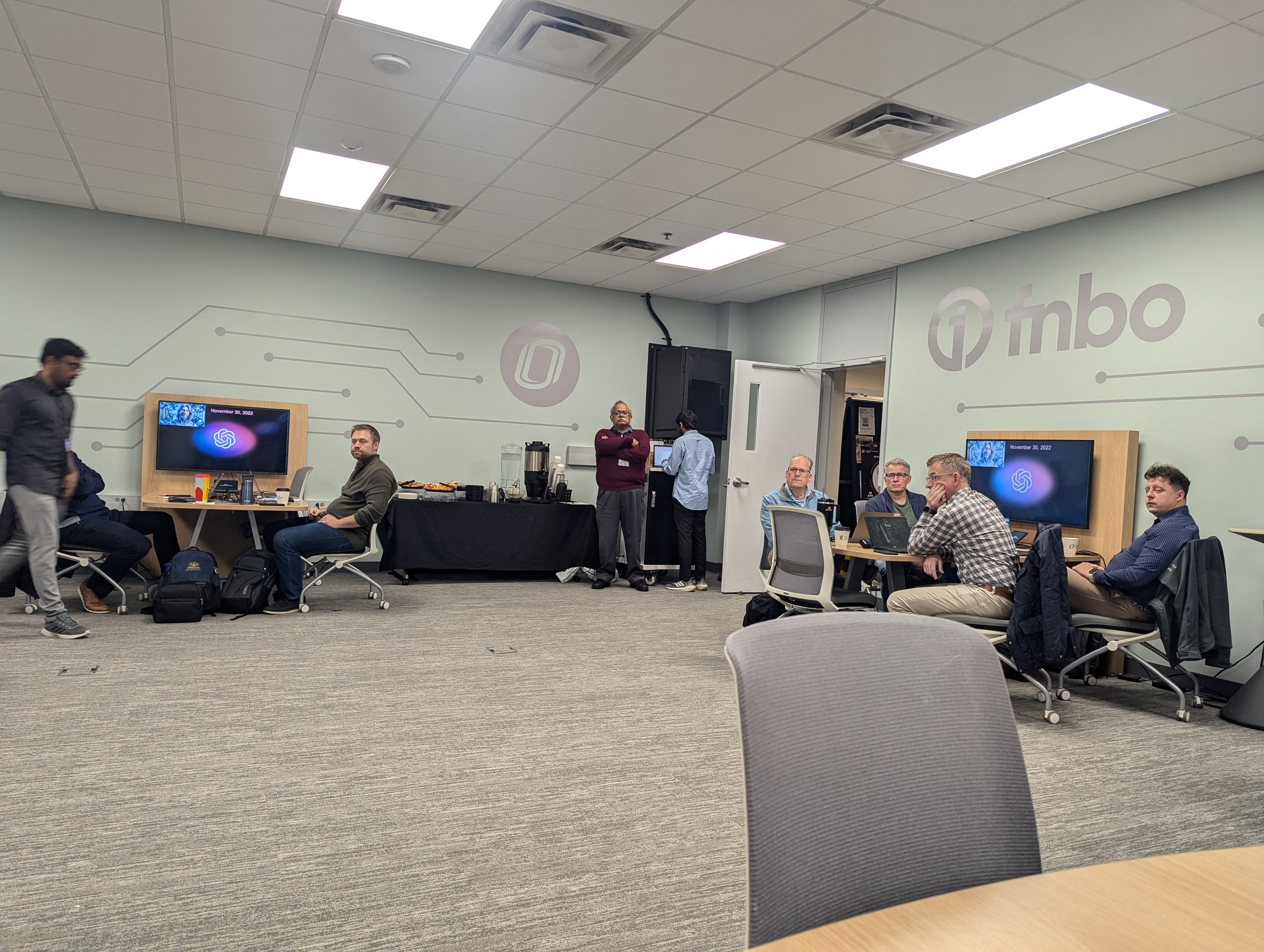 Executives collaborating at workstations