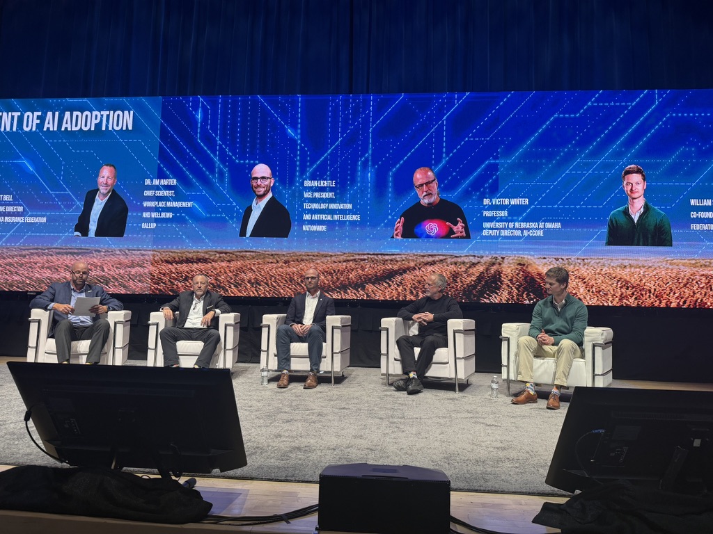 Five panelists seated onstage during “The Human Element of AI Adoption” at Insurtech on the Silicon Prairie 2026 in Omaha, including Victor Winter, professor at the University of Nebraska at Omaha and deputy director of AI-CCORE.
